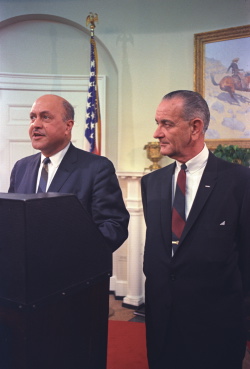 President Lyndon B. Johnson signs Public Law 90-130. The Nov. 8, 1967,  event opened promotions