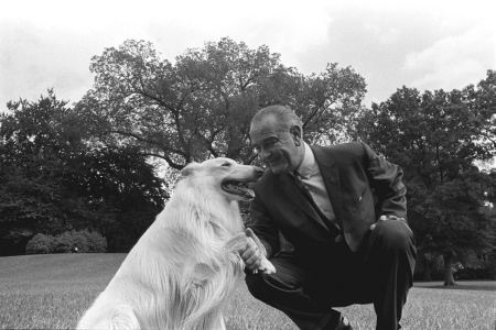 President Lyndon B. Johnson with one of his dogs